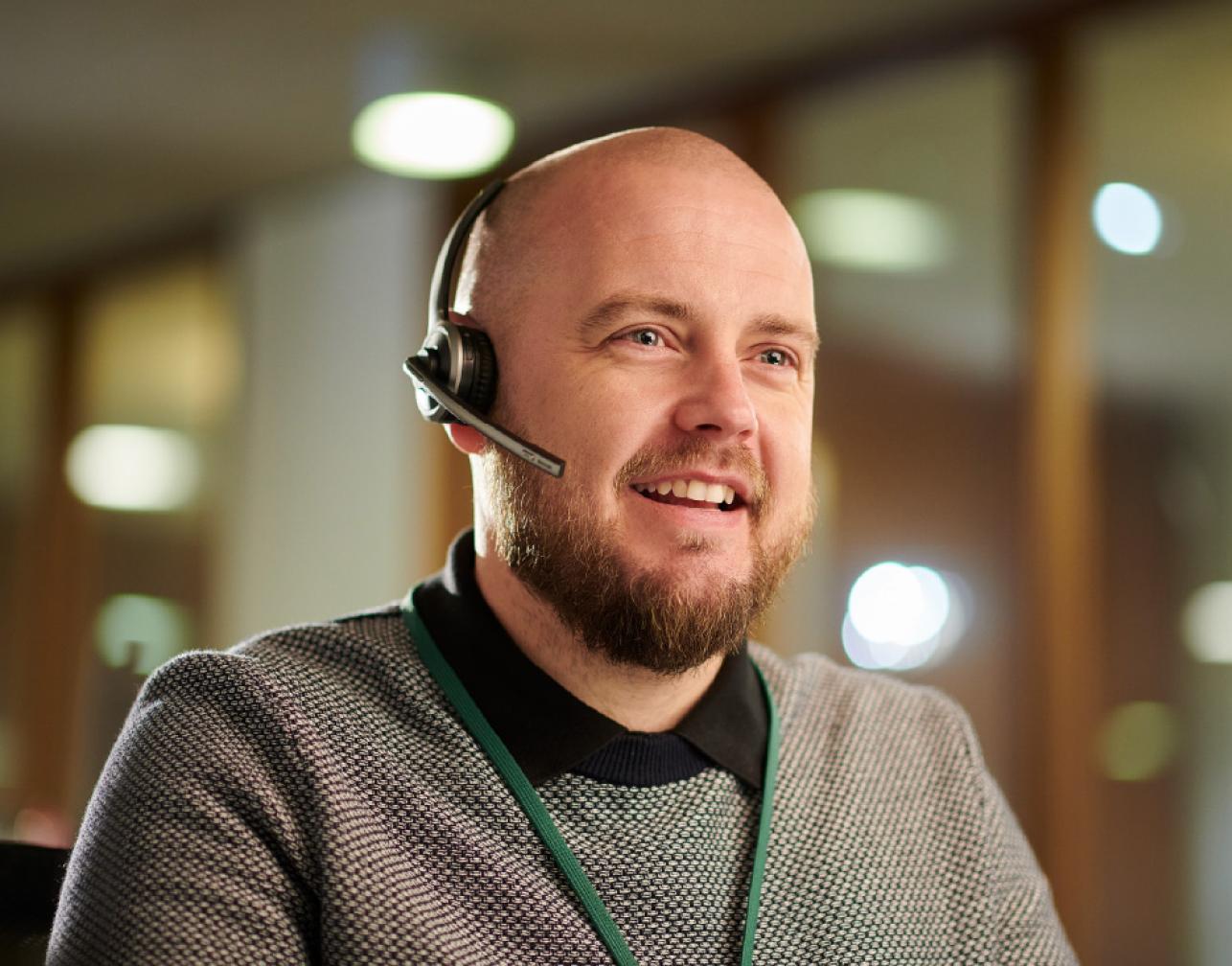 a man talking on a headset