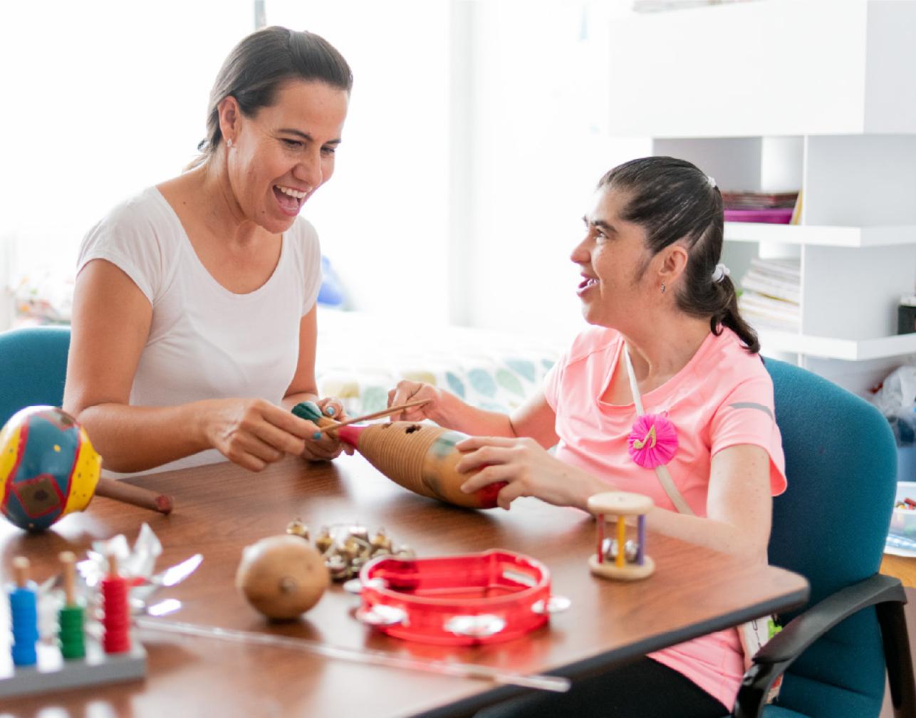 Two people playing musical instruments